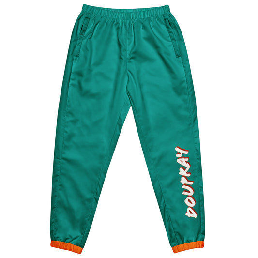 Model wearing Do U Pray unisex track pants with tapered ankle and subtle faith-inspired branding