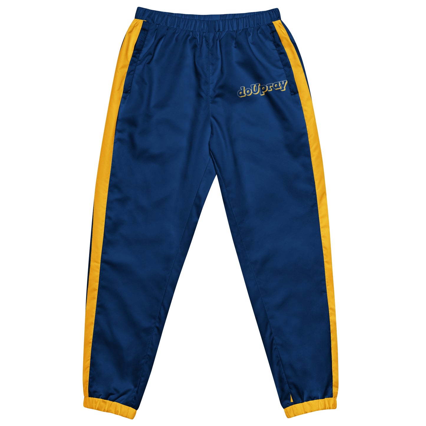 Unisex wearing Do U Pray track pants in black with subtle side branding