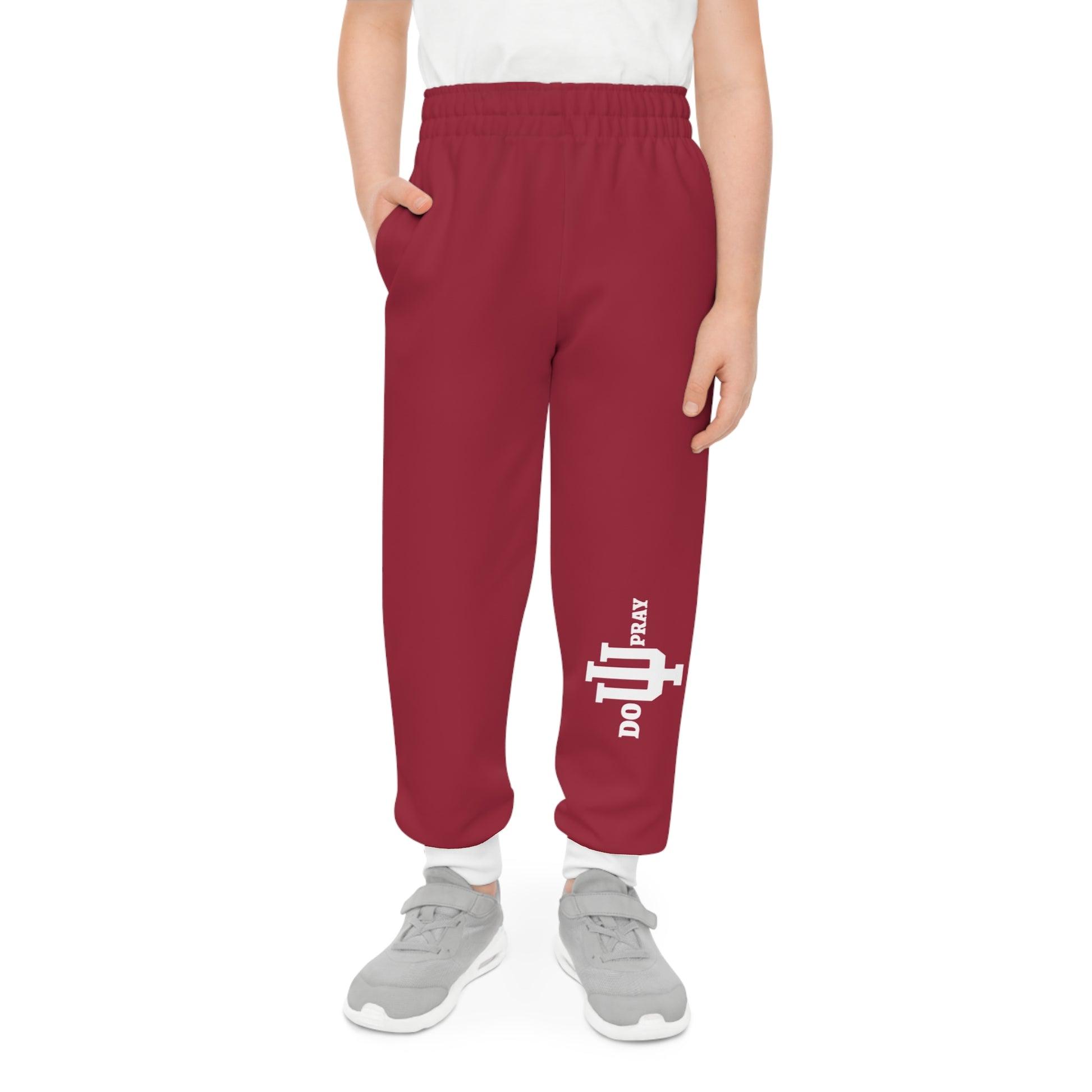 Youth Joggers (AOP) – Soft, stylish joggers featuring a bold all-over print, part of the Believe Church Collection.